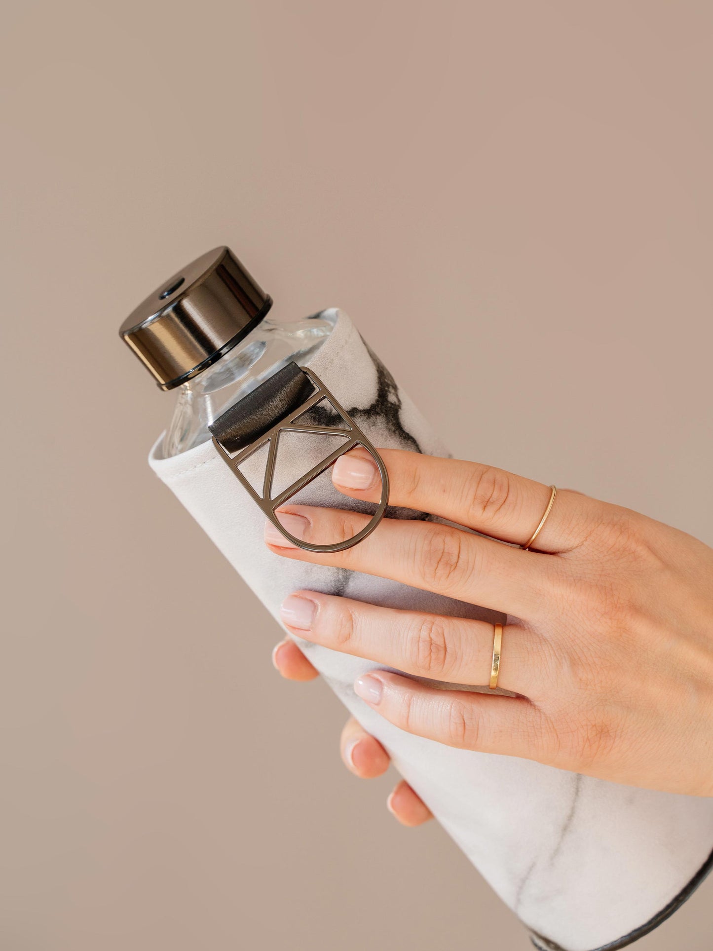 Close up of holder of Mismatch Stone glass water bottle