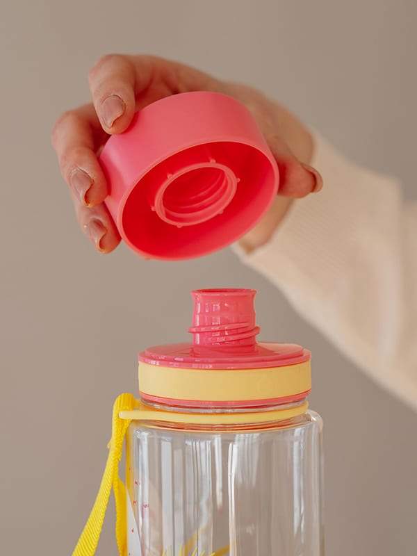 EQUA BPA FREE water bottle, Flamingo, close up of the lid and mouthpiece, pink and yellow color