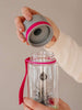 EQUA BPA FREE water bottle, Dandelion, close up of the lid, pink and grey color