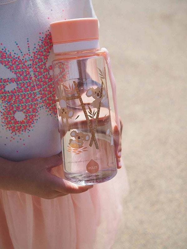 EQUA BPA FREE water bottle, Playground, close up of the bottle held by a girl, motif of koalas, pink color