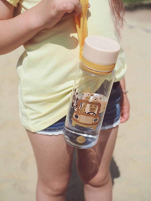 EQUA BPA FREE water bottle, Safari, close up of the bottle held in hands, motif of animals, beige color
