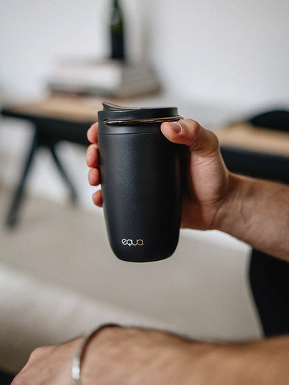 EQUA Cup Black in hands 400 ml volume