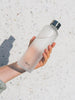 Holding in hand minimalist EQUA water bottle Black velvet
