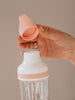 EQUA BPA FREE FLOW 2 in 1 water bottle, Beat, close up of the lid and mouthpiece, peach color